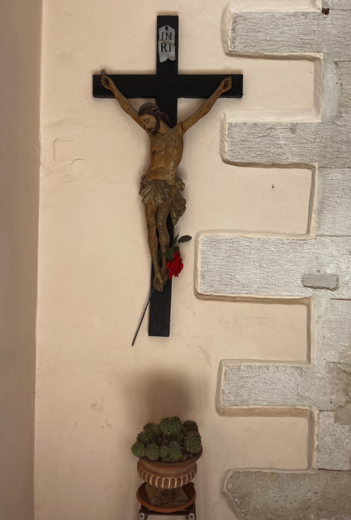 A crucifix at the entrance of the Assumption Catholic Cathedral.