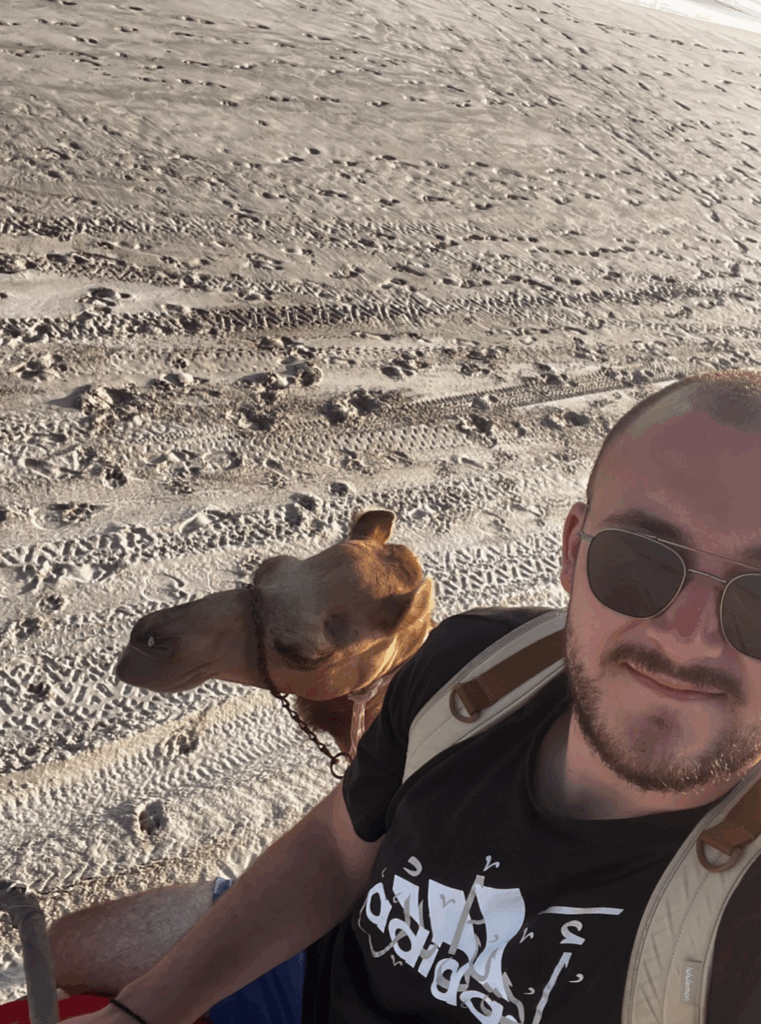 Riding a camel in Salalah