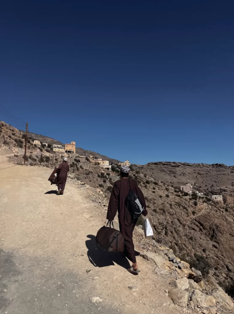 locals helping me with my luggage 