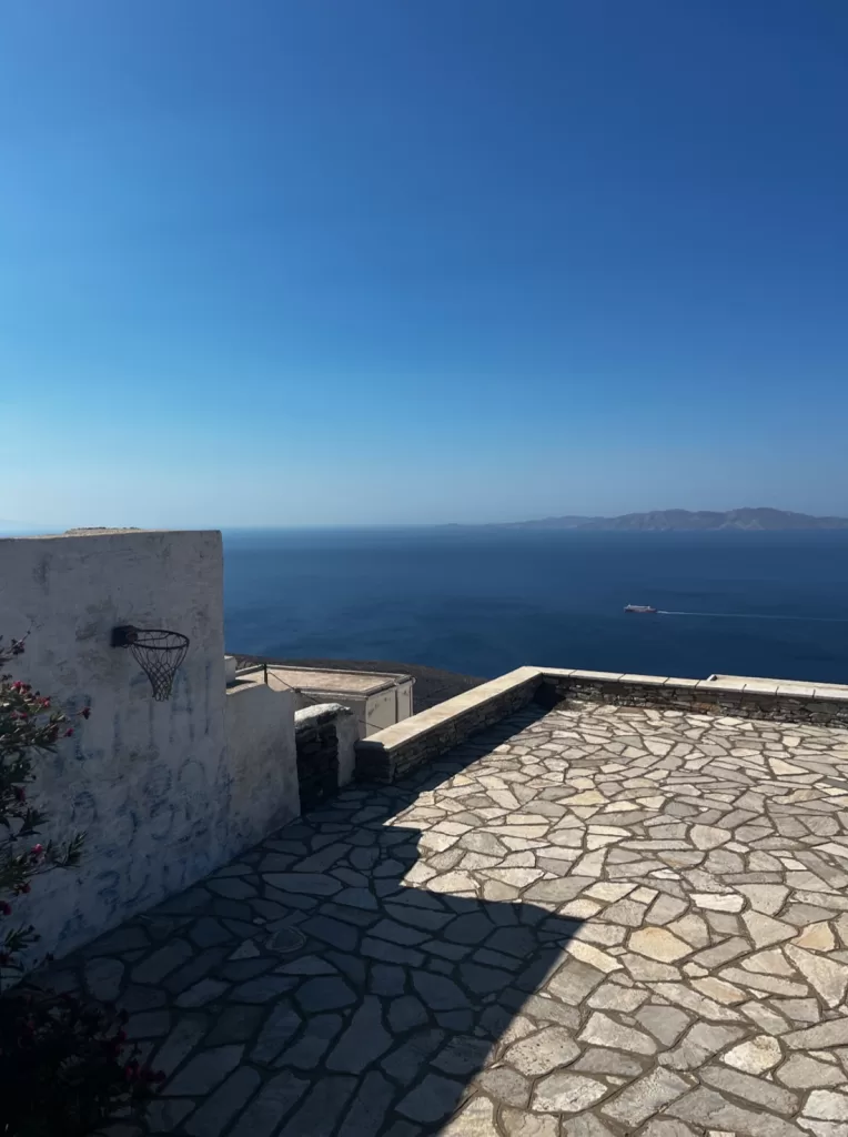 A basketball hoop overlooking the Aegean Sea on Tinos
