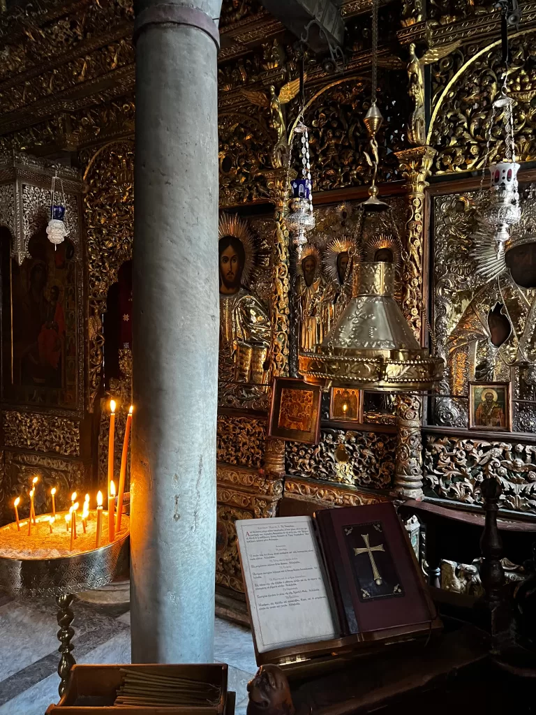 candle lit chapel inside Iviron Monastery Mount Athos