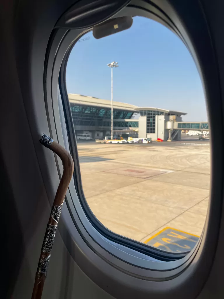view of muscat international airport with a traditional omani stick